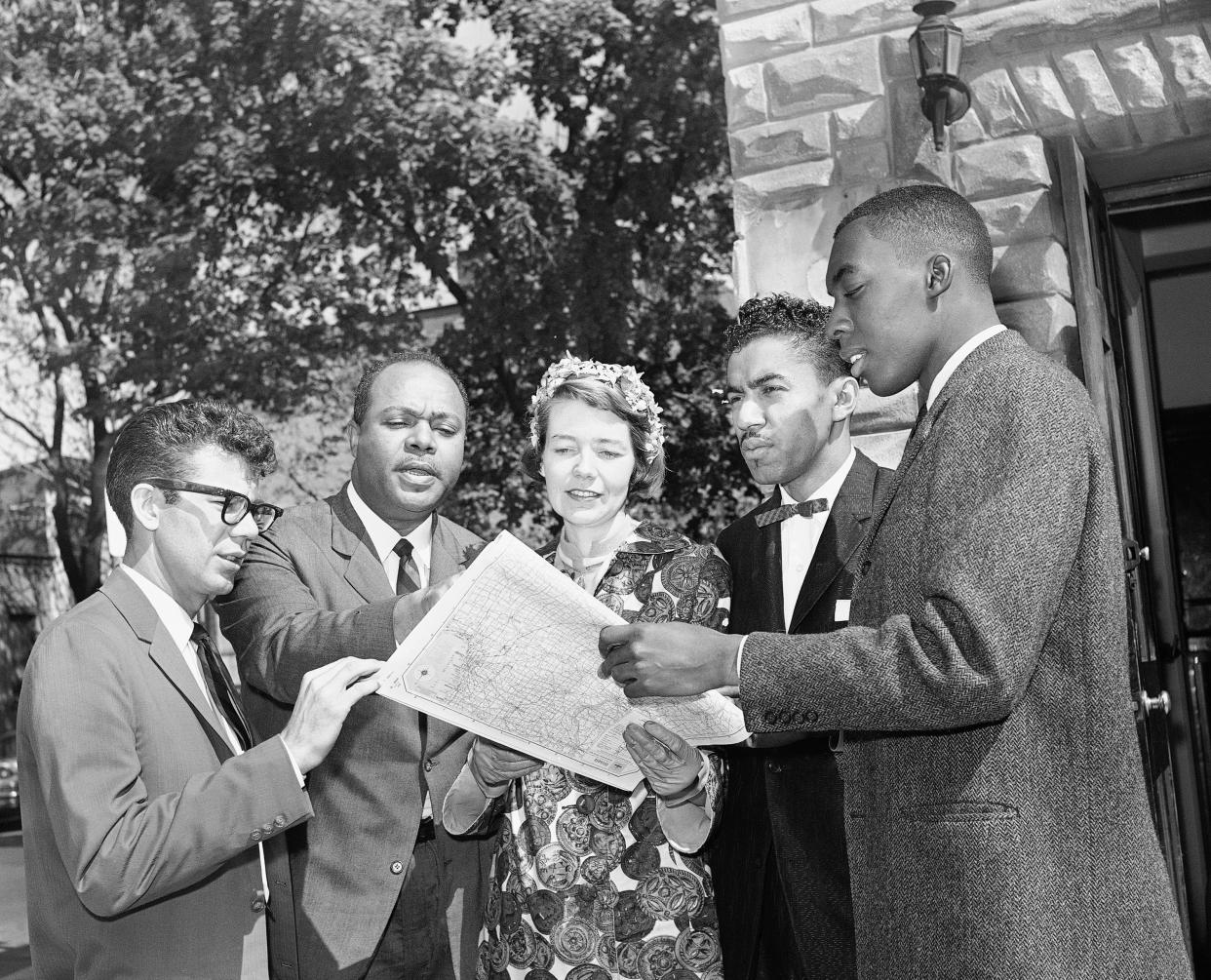 Members of an interracial group pose in Washington, with a map of a route they plan to take to test segregation in bus terminal restaurants and rest rooms in the South, May 4, 1961. From left are: Edward Blankenheim, Tucson, Ariz.; James Farmer, New York City; Genevieve Hughes, Chevy Chase, Md.; the Rev. B. Elton Cox, High Point, N.C., and Henry Thomas, St. Augustine, Fla. They are all members of the Congress of Racial Equality, the organization sponsoring the trip.
