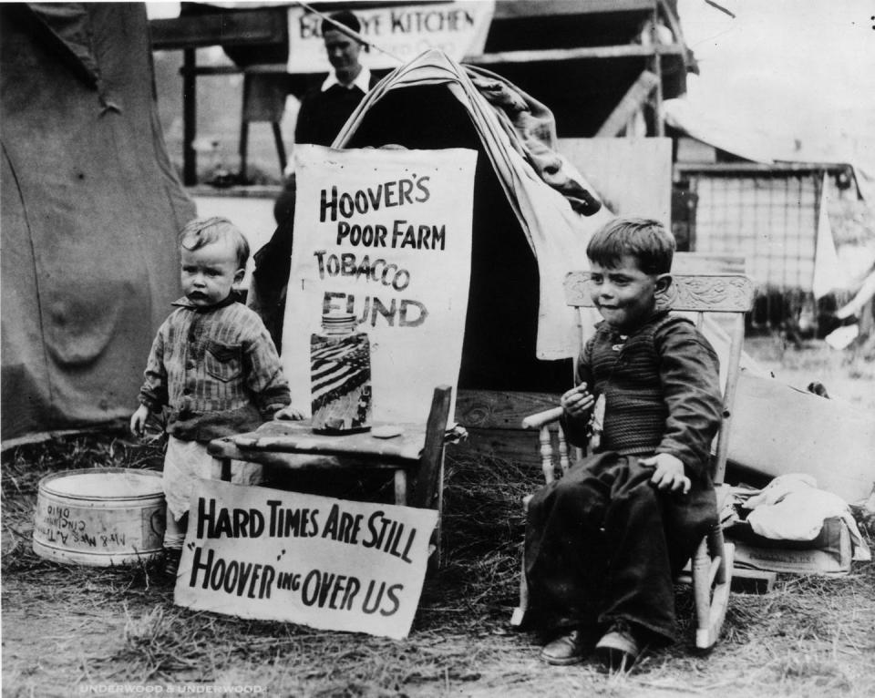 <span class="caption">Two boys living in a ‘Hooverville’ shantytown in Washington, D.C.</span> <span class="attribution"><a class="link " href="https://www.gettyimages.com/detail/news-photo/two-young-residents-at-a-hooverville-shantytown-in-news-photo/2669031?adppopup=true" rel="nofollow noopener" target="_blank" data-ylk="slk:MPI/Stringer via Getty Images;elm:context_link;itc:0;sec:content-canvas">MPI/Stringer via Getty Images</a></span>