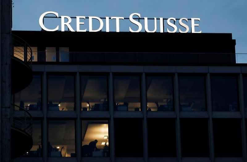 FILE PHOTO: A logo of Credit Suisse is pictured on a building in Geneva