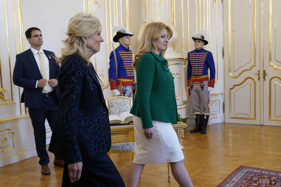 First lady Jill Biden, left, and President of Slovakia Zuzana Caputova arrive for a photo opportunity at the Presidential Palace in Bratislava, Slovakia, Monday, May 9, 2022. (AP Photo/Susan Walsh, Pool)