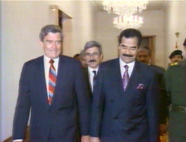 Dan Rather, left, with Saddam Hussein in Baghdad. The interview was broadcast on "CBS Evening News" in 1990.