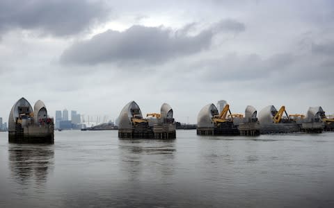 London is protected by the Thames Barrier which was constructed after widespread flooding in 1953 - Credit: Stefan Rousseau/PA