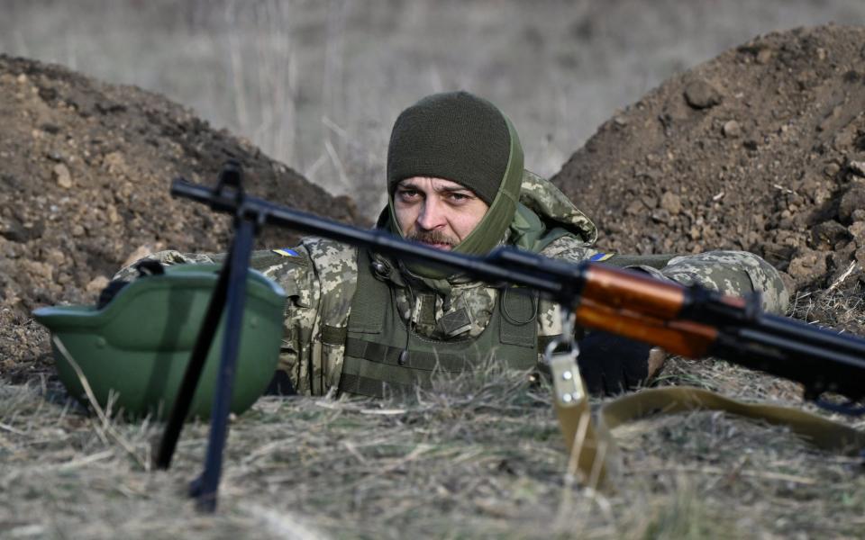 A Ukrainian serviceman of the 42nd Mechanised Brigade takes part in a field military exercise in the Donetsk region