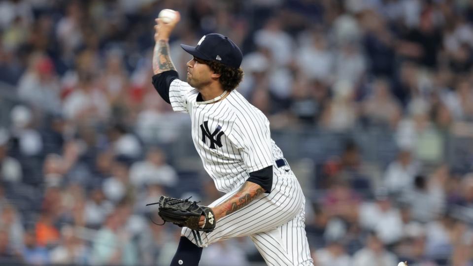 Jul 6, 2023; Bronx, New York, USA; New York Yankees relief pitcher Deivi Garcia (83) pitches against the Baltimore Orioles during the fourth inning at Yankee Stadium. Mandatory Credit: Brad Penner-USA TODAY Sports