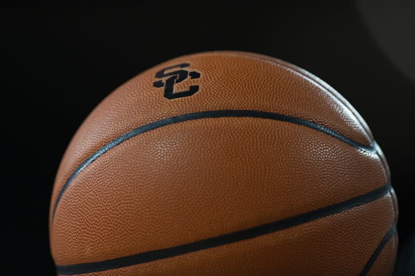 Detail of Southern California logo on a basketball during an NCAA college basketball game between Southern California and UC Irvine Wednesday, Dec. 15, 2021, in Los Angeles. (AP Photo/Kyusung Gong)