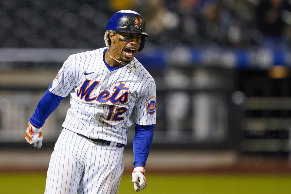 New York Mets' Francisco Lindor runs the bases after hitting a two-run home run off Arizona Diamondbacks pitcher Caleb Smith during the seventh inning of a baseball game Friday, May 7, 2021, in New York. (AP Photo/John Minchillo)