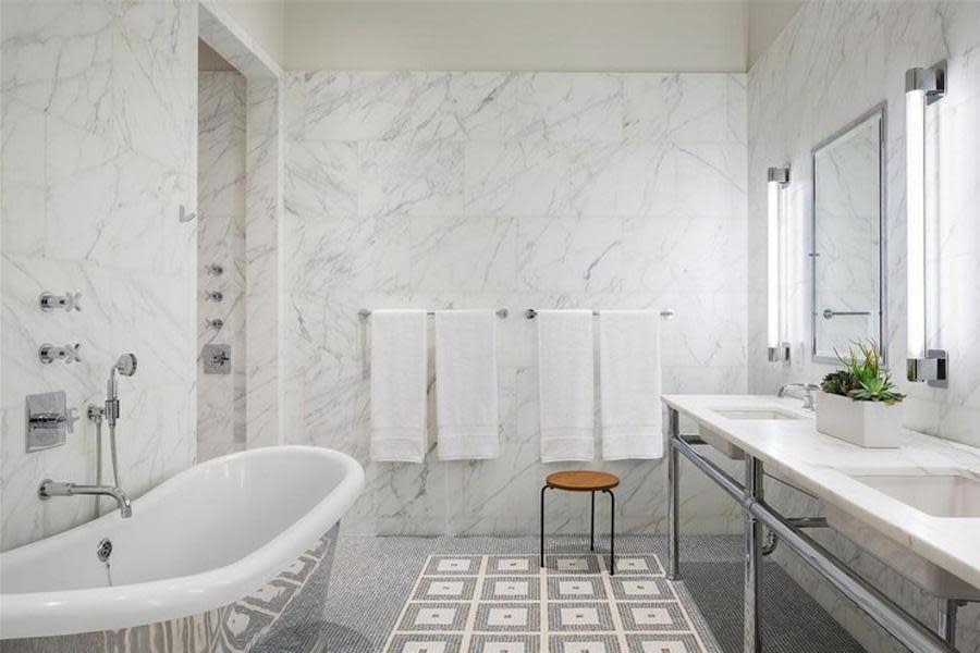 The marble carries through into the bathrooms as well.