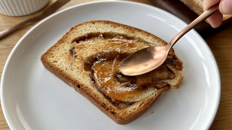 Jam on toasted cinnamon-apple swirl bread