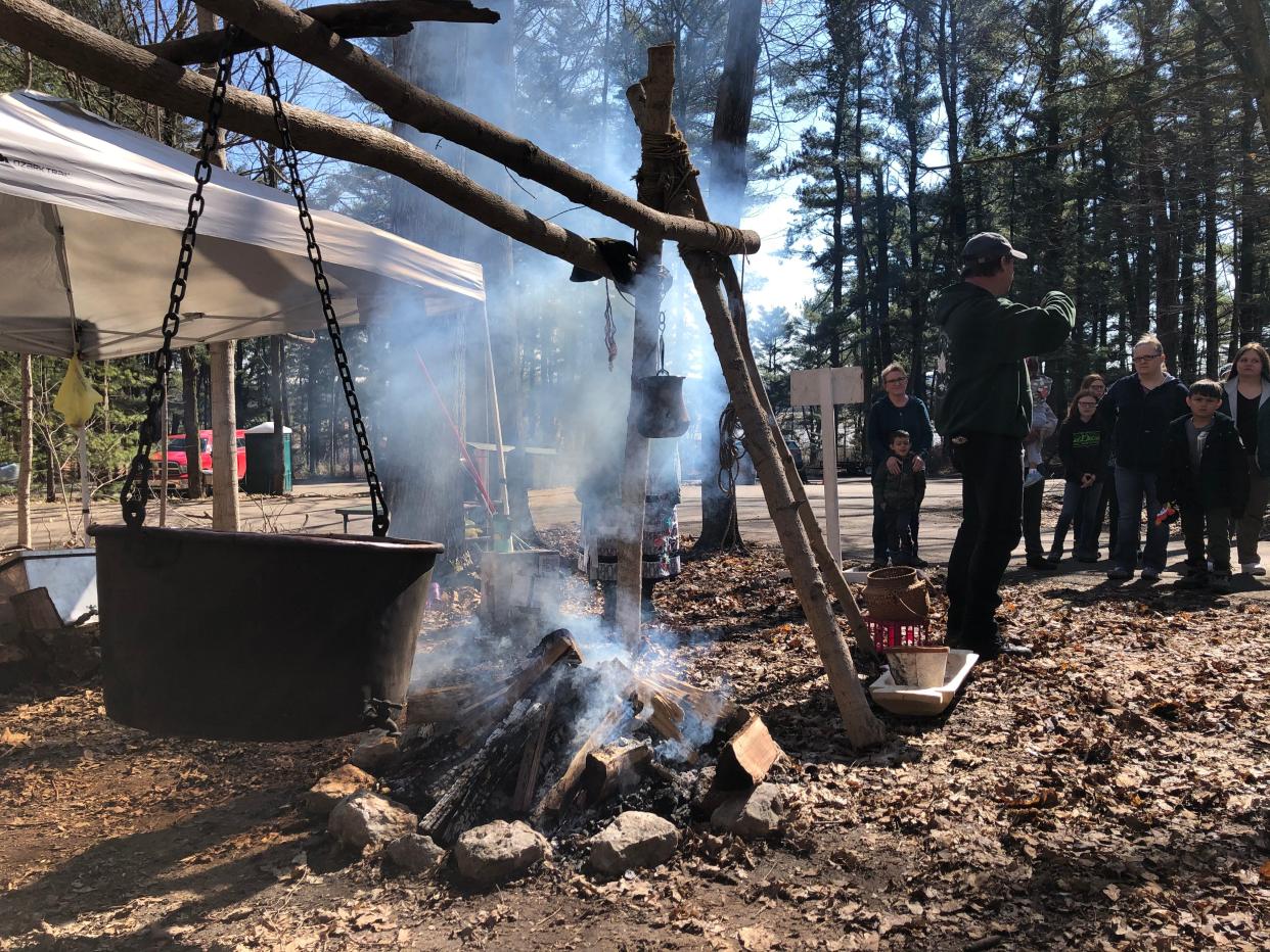 Native American maple sugar making methods are demonstrated at Sugar Camp Days in 2022 at Bendix Woods County Park in New Carlisle.