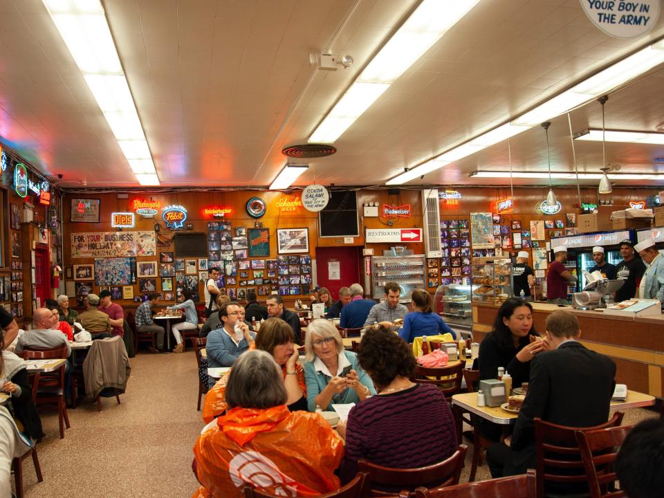 View of crowded dining room at Katz's Delicatessen in New York City