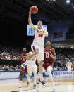 Belmont's Seth Adelsperger (50) shoots during the first half of a First Four game of the NCAA college basketball tournament against Temple, Tuesday, March 19, 2019, in Dayton, Ohio. (AP Photo/John Minchillo)