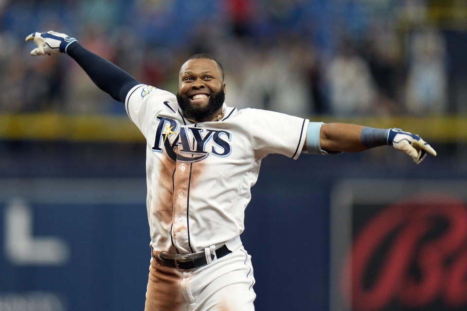 Tampa Bay Rays' Manuel Margot celebrates after his walk-off single off Los Angeles Angels relief pitcher Carlos Estevez during the ninth inning of a baseball game Thursday, Sept. 21, 2023, in St. Petersburg, Fla. (AP Photo/Chris O'Meara)