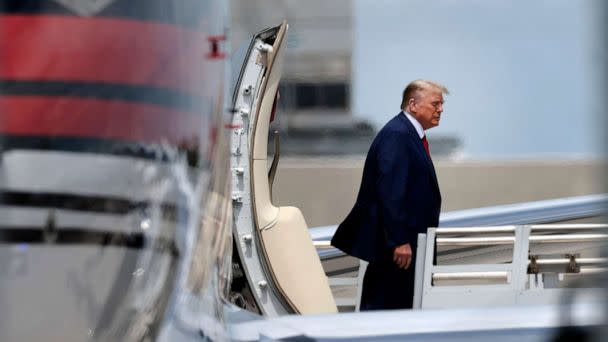 PHOTO: Republican presidential candidate former President Donald Trump arrives at the Miami International Airport on June 12, 2023, in Miami. (Win Mcnamee/Getty Images)