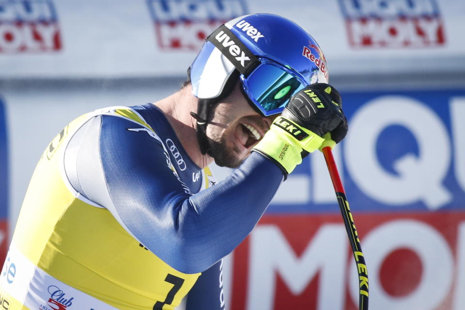 Italy's Dominik Paris reacts in the finish area following his run in the men's World Cup downhill ski race in Lake Louise, Alberta, Canada, on Saturday, Nov. 30, 2019. (Jeff McIntosh/The Canadian Press via AP)