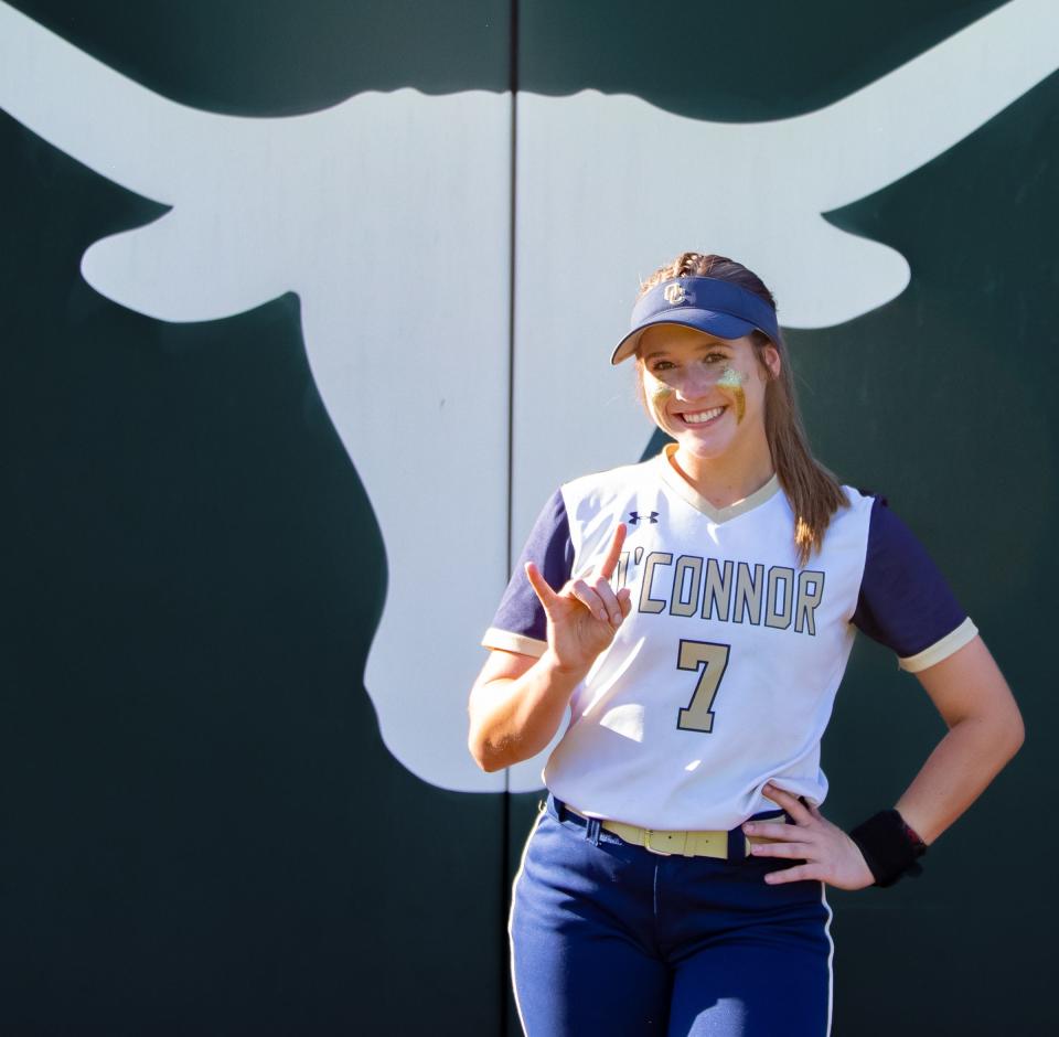 Infielder Leighann Goode flashes a "Hook ❜em, Horns" sign after leading San Antonio O'Connor High School to the Class 6A state championship at McCombs Field in June. Goode, one of five freshmen on the Texas softball team, could get plenty of playing time in the infield.
