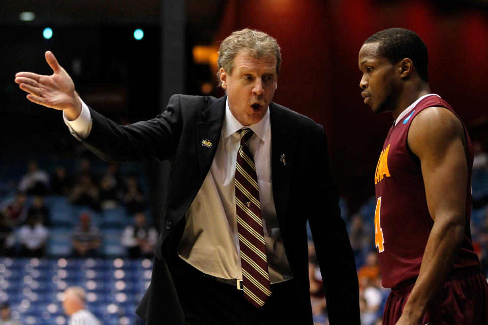 DAYTON, OH - MARCH 13: Head coach Tim Cluess of the Iona Gaels talks with Ra'Shad James #4 in the second half while taking on the Brigham Young Cougars in the first round of the 2011 NCAA men's basketball tournament at UD Arena on March 13, 2012 in Dayton, Ohio. 