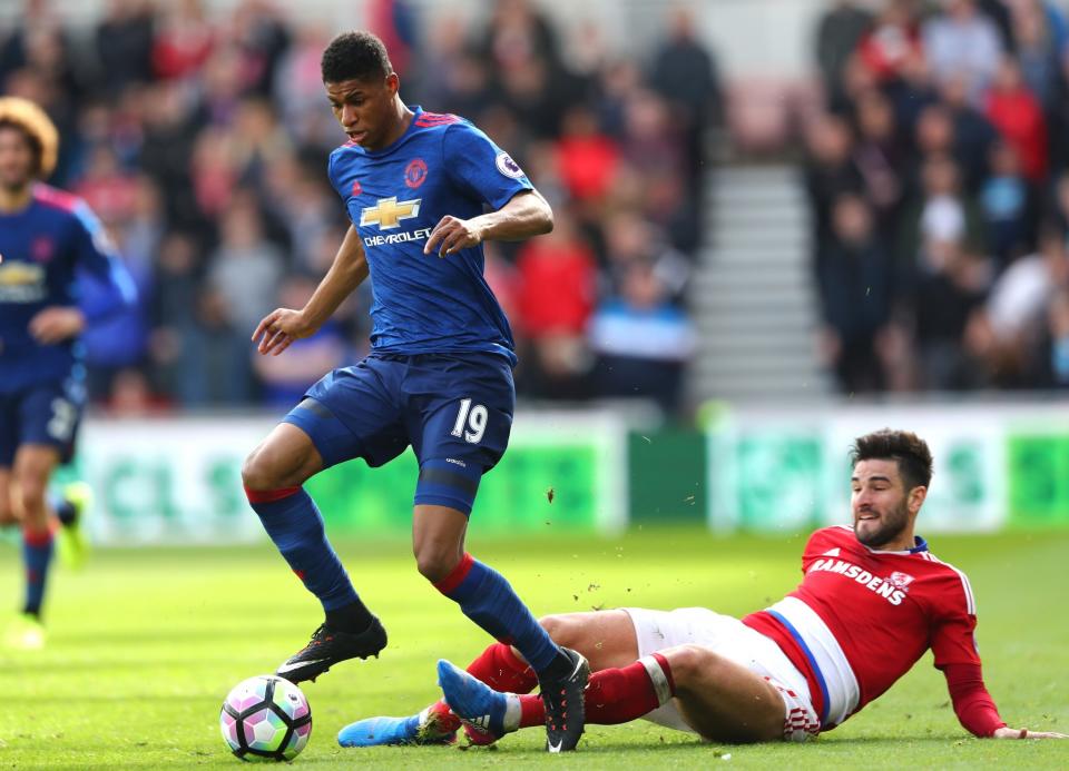 <p>Marcus Rashford leaves the Boro defender grounded </p>