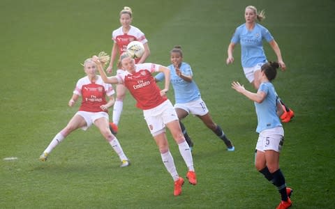 Louise Quinn of Arsenal heads the ball during the FA Women's Continental League Cup Final between Arsenal and Manchester City Women at Bramall Lane - Credit: Getty images