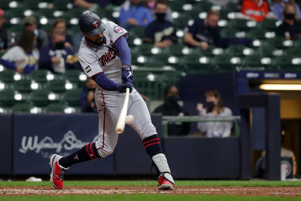 Minnesota's Byron Buxton  hits a solo home run against the Milwaukee Brewers during the seventh inning.