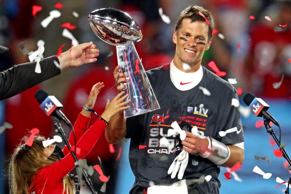 Tampa Bay Buccaneers quarterback Tom Brady  celebrates after beating the Kansas City Chiefs in Super Bowl 55.