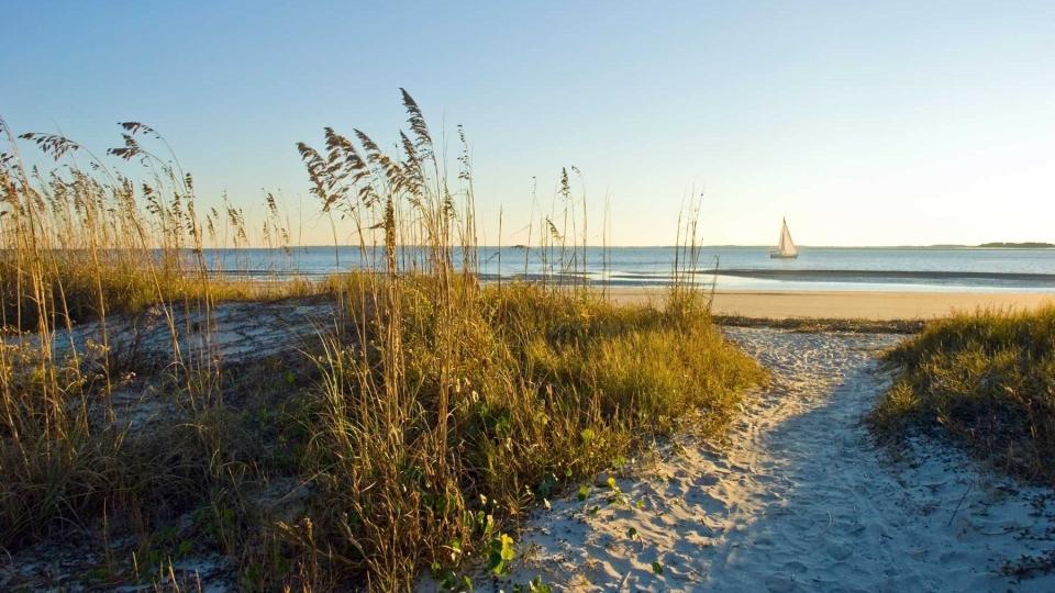 A sailboat seen of the coast of Hilton Head Island in South Carolina