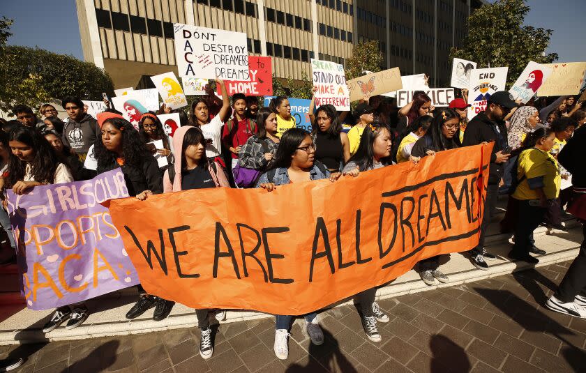 LOS ANGELES, CA - NOVEMBER 12, 2019 High school students and members of the public rally at the Roybal Federal Building in downtown Los Angeles before marching to MacArthur Park Tuesday morning as the Supreme Court hears oral arguments in Washington on the possible cancellation of the program. (Al Seib / Los Angeles Times)