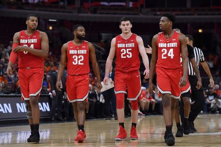 Dec 5, 2018; Chicago, IL, USA; Ohio State Buckeyes forward Kaleb Wesson (34), Buckeyes guard Keyshawn Woods (32), Buckeyes forward Kyle Young (25) and Buckeyes forward Andre Wesson (24) return to the game after a timeout against the Illinois Fighting Illini at United Center. Quinn Harris-USA TODAY Sports