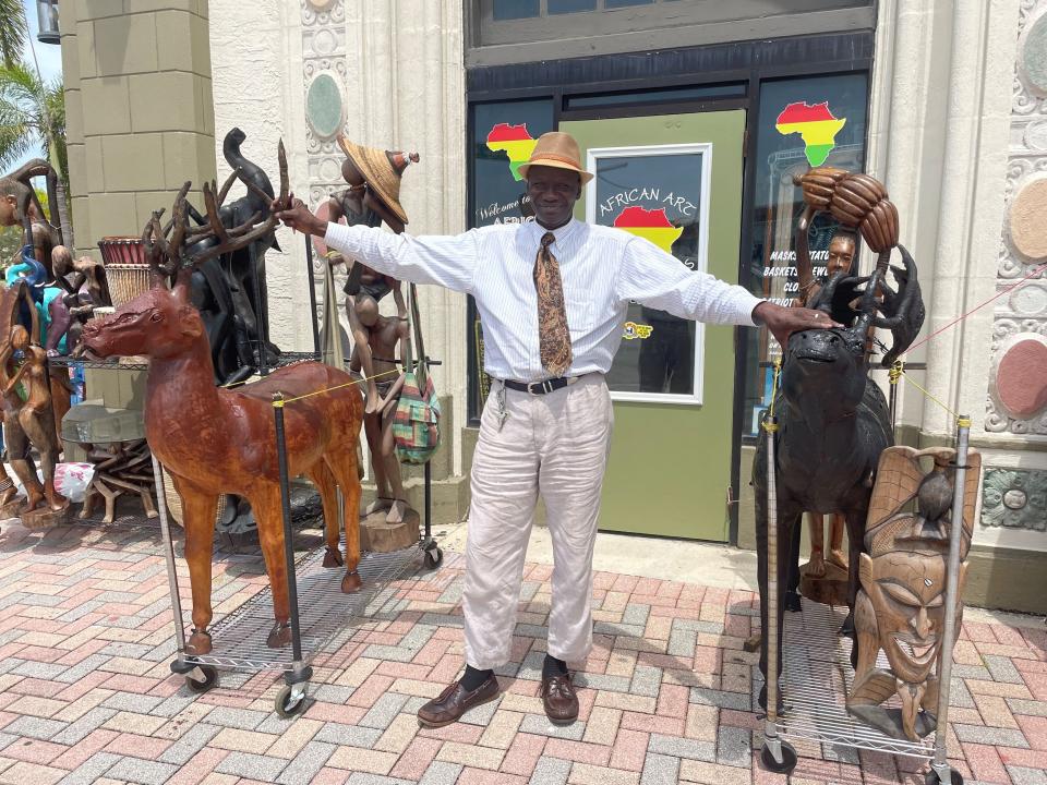 Ndiaga Niang, pictured Wednesday, June 21, 2023, across the street from the Alto Lee Adams Sr. United States Courthouse in Fort Pierce, Fla., said he brings Africa to Florida in his downtown Fort Pierce store, Africa Art, Antiques and Gifts. Niang, who immigrated to the United States from Senegal more than 30 years ago, imports everything from home decor to clothes, jewelry and accessories from artists across Africa.