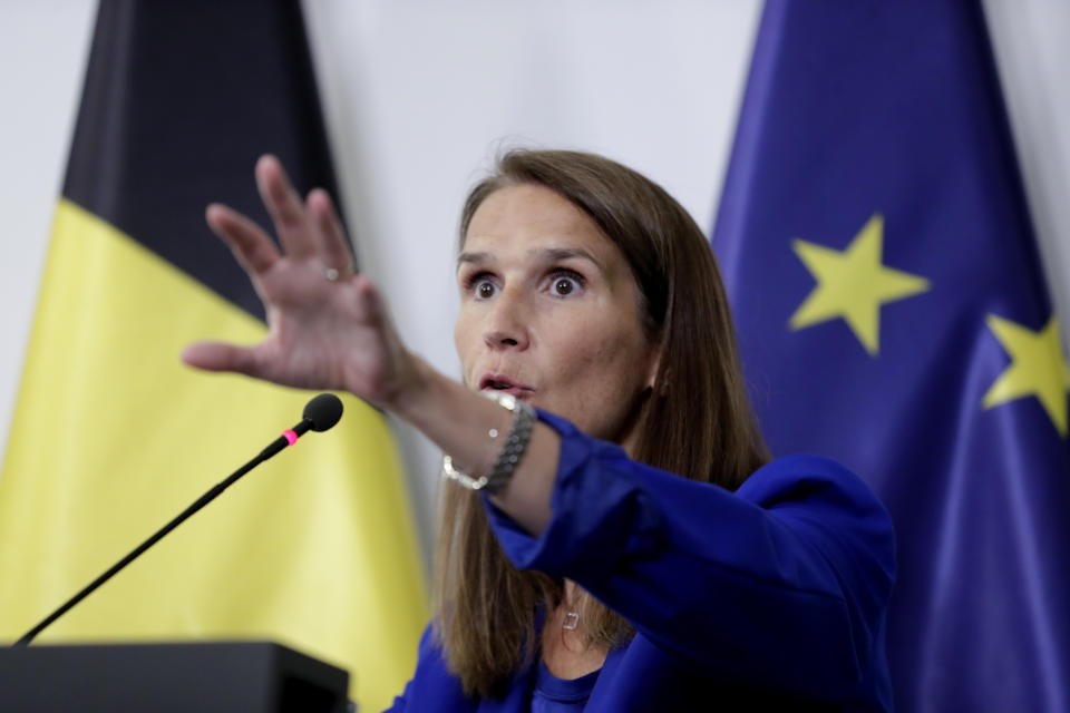 Belgian Prime Minister Sophie Wilmes speaks during a press conference following the National Security Council meeting on the COVID-19 outbreak, in Brussels, Wednesday, Sept. 23, 2020. Belgium's prime minister announced Wednesday a relaxation of social-distancing rules as part of a less stringent long-term coronavirus strategy, despite the steady rise of COVID-19 cases in a country already hard-hit by the virus. (Olivier Hoslet, Pool via AP)