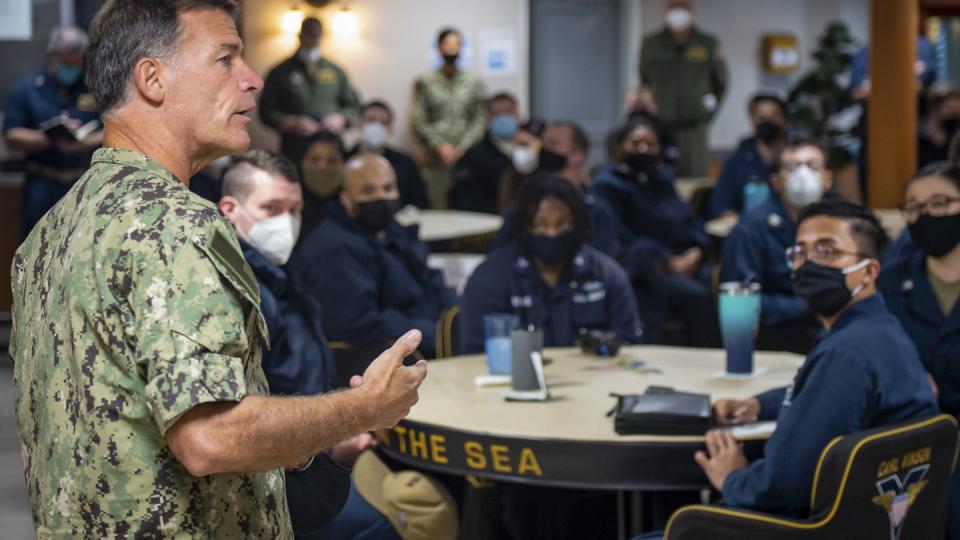 Adm. John Aquilino, commander, U.S. Pacific Fleet, speaks with sailors assigned to the aircraft carrier Carl Vinson during a stand-down to address extremism in the ranks. (MCS Mason Congleton/Navy)