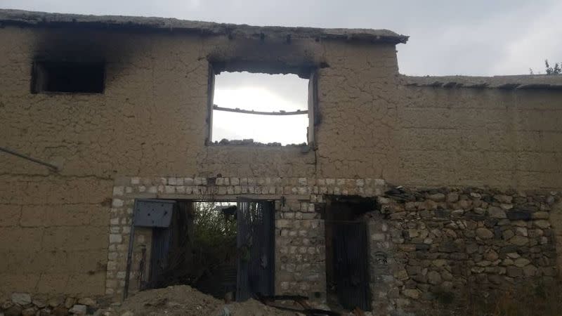 View of ruins of destroyed ancestral home of Nangarhar provincial official Ajmal Omar in Kodi Khel