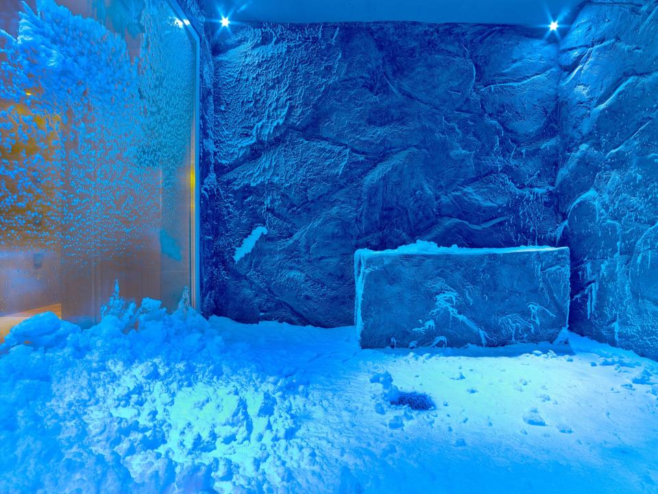 a blue room full of snow and ice