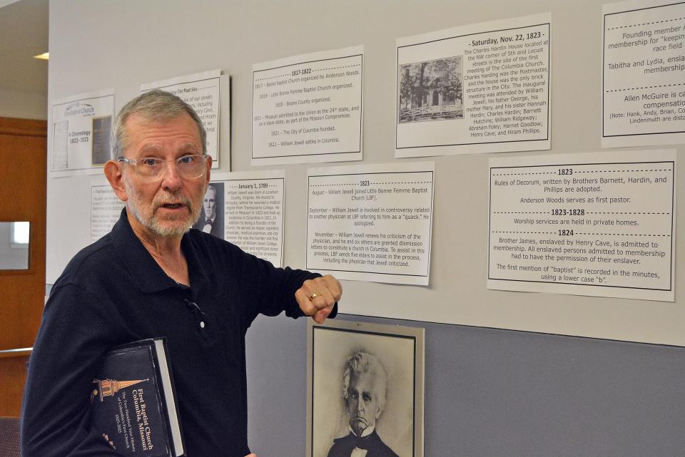 First Baptist Church Historian Ken Hammann explains the founding of the church in November 1823 during a walkthrough in Mid-October of a timeline he has prepared and displayed at the church.