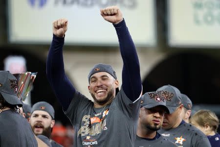 Oct 21, 2017; Houston, TX, USA; Houston Astros center fielder George Springer (4) celebrates after game seven of the 2017 ALCS playoff baseball series between the Houston Astros and the New York Yankees at Minute Maid Park. Thomas B. Shea-USA TODAY Sports