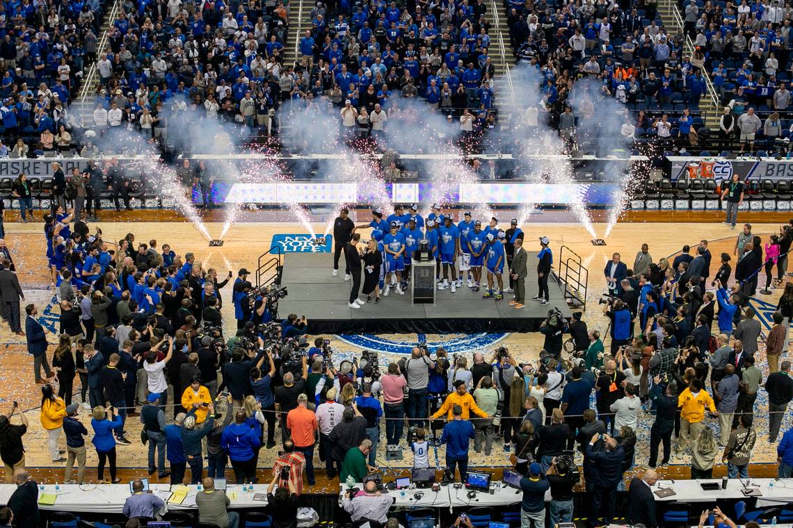 The Duke Blue Devils celebrate with the ACC Tournament Championship trophy following their 59-49 victory over Virginia on Saturday, March 11, 2023 at the Greensboro Coliseum in Greensboro, N.C.