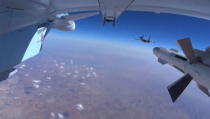 A frame grab taken from footage from a camera under a plane, released by Russia's Defence Ministry October 22, 2015, shows military jets of the Russian air force during a sortie at an unknown location in Syria. REUTERS/Ministry of Defence of the Russian Federation/Handout via Reuters