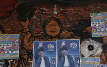 Posters of former Bolivian President Evo Morales adorn a wall in El Alto, Bolivia, Thursday, Oct. 15, 2020. Bolivia will hold general elections on Sunday, although Morales is not a candidate. (AP Photo/Juan Karita)