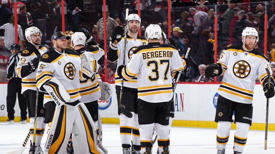 OTTAWA, ON - APRIL 21: Zdeno Chara #33 of the Boston Bruins celebrates their overtime win against the Ottawa Senators with teammates Patrice Bergeron #37, Joe Morrow #45, Anton Khudobin #35 and Drew Stafford #19 in Game Five of the Eastern Conference First Round during the 2017 NHL Stanley Cup Playoffs at Canadian Tire Centre on April 21, 2017 in Ottawa, Ontario, Canada.  (Photo by Jana Chytilova/Freestyle Photography/Getty Images) *** Local Caption ***