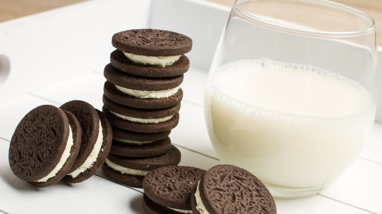 Oreo cookies next to milk