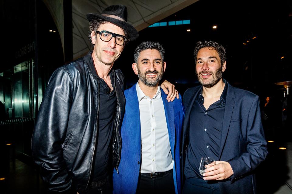 Sacha Baron Cohen (left) and Mark Godfrey (center)