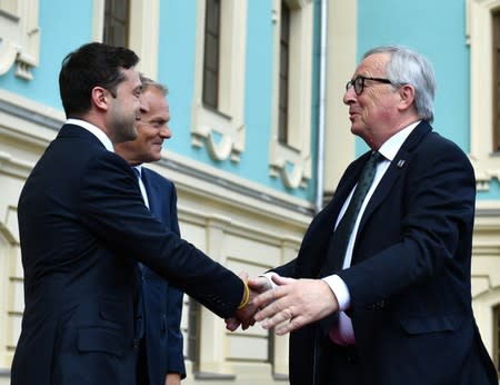 Ukraine's President Volodymyr Zelenskiy meets with European Council President Donald Tusk and European Commission President Jean-Claude Juncker in Kiev