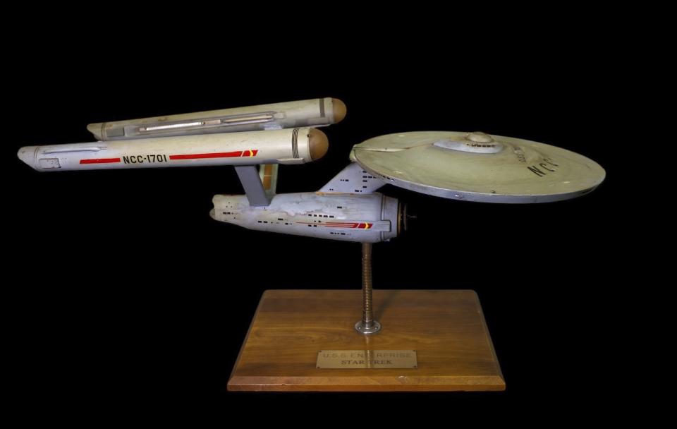 The first model of the USS Enterprise is displayed at Heritage Auctions in Los Angeles, April 13, 2024. The model — used in the original “Star Trek” television series — has been returned to Eugene “Rod” Roddenberry, the son of “Star Trek” creator Gene Roddenberry, decades after it went missing in the 1970s. (Josh David Jordan/Heritage Auctions via AP)