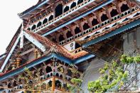 <p><b>Grand entrance gable and balcony at Ponnani Juma Masjid.</b><br><em>©Donald Fels / Published in ‘Mosques of Cochin’ by Patricia Tusa Fels</em><br> Ponnani, a port city located north of Cochin, was inhabited from first century AD, and it was a religious centre of temples and mosques. The Ponnani Juma Masjid was built in the 1500s. The fantastic displays of mosques such as this one and Chembitta Palli may have been a direct response to the Portuguese efforts at destruction of the Muslims’ trade dominance and their faith.</p>