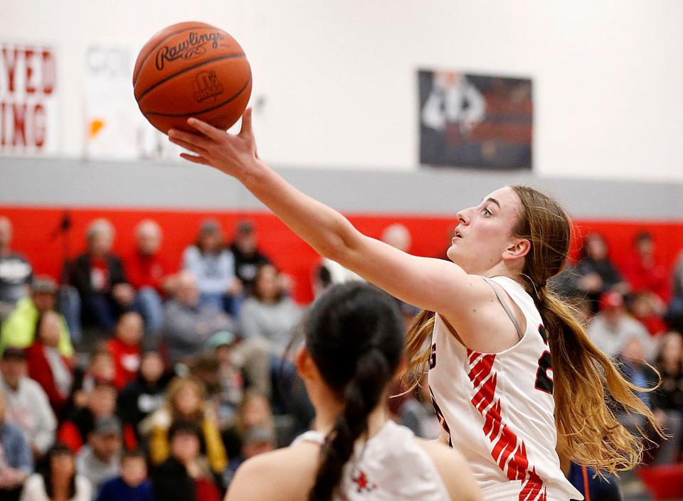 Loudonville High School's Sophia Spangler (20) drives in for lay up against Ellet High School during girls high school basketball action at Loudonville High School Tuesday, Feb. 7, 2023. TOM E. PUSKAR/ASHLAND TIMES-GAZETTE