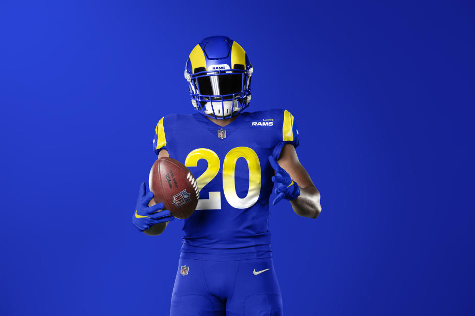 This undated graphic image released by the Los Angeles Rams NFL football team shows a model in their 'royal' uniform color scheme. The Rams have unveiled new uniforms ahead of their move into SoFi Stadium this year. (Los Angeles Rams via AP)