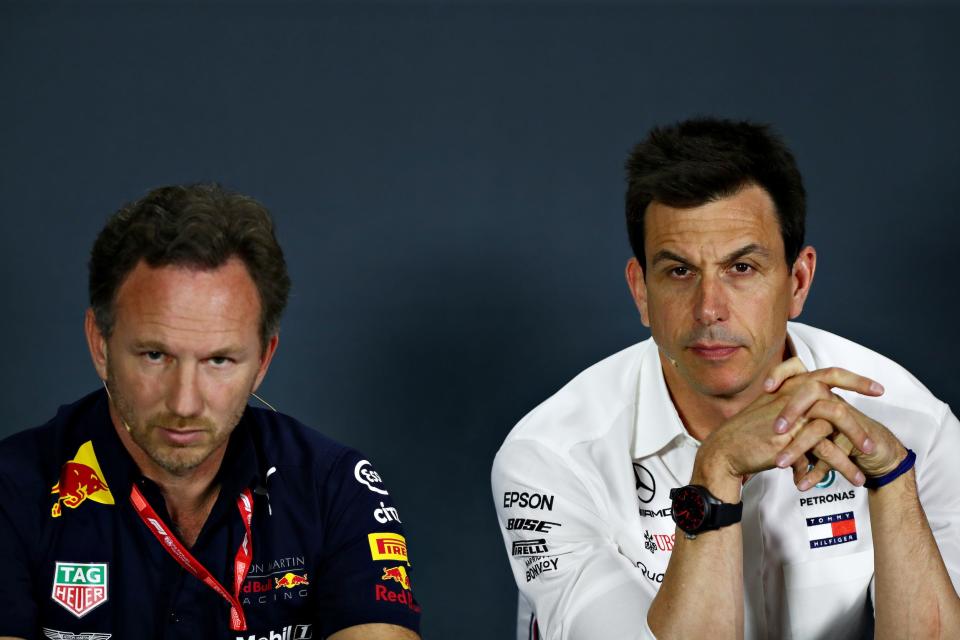 Mercedes boss Toto Wolff (right) and Red Bull boss Christian Horner speak with the media.