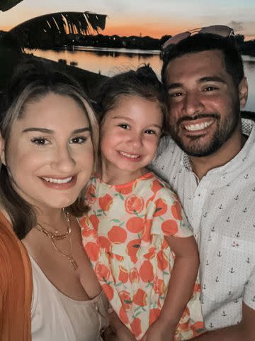 <p>Courtesy of Paige Robison</p> Paige Robison and Josh Davila with their daughter, Wren