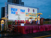 GE 2011 candidate for AMK GRC Vignes Ramachandran takes the stage as RP's first speaker. (Yahoo! photo/Alvin Ho)