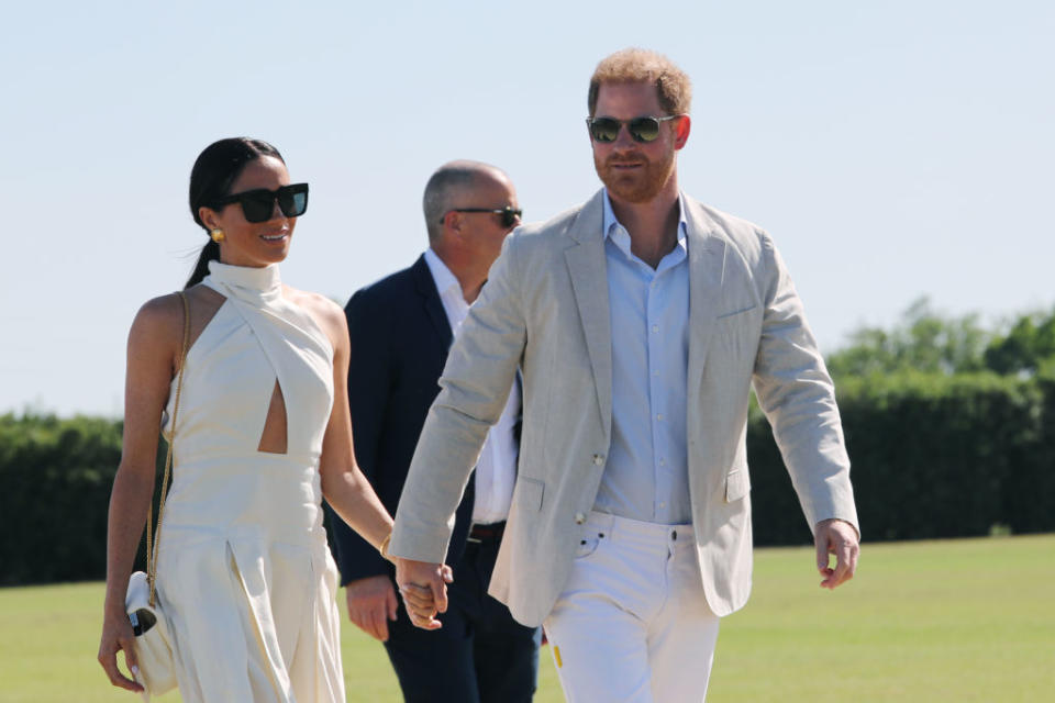 Duchess Meghan and Prince Harry, celebrity style, Duke and Duchess of Sussex, and Heidi Merrick attend the Royal Salute Polo Challenge in Wellington, Florida on April 12th