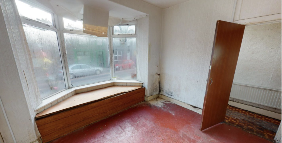 The home features two reception areas, though the property may require updating. Source: Paul Fosh Auctions